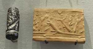 Sceau-cylindre néo-assyrien représentant le dieu Assur combattant un monstre.